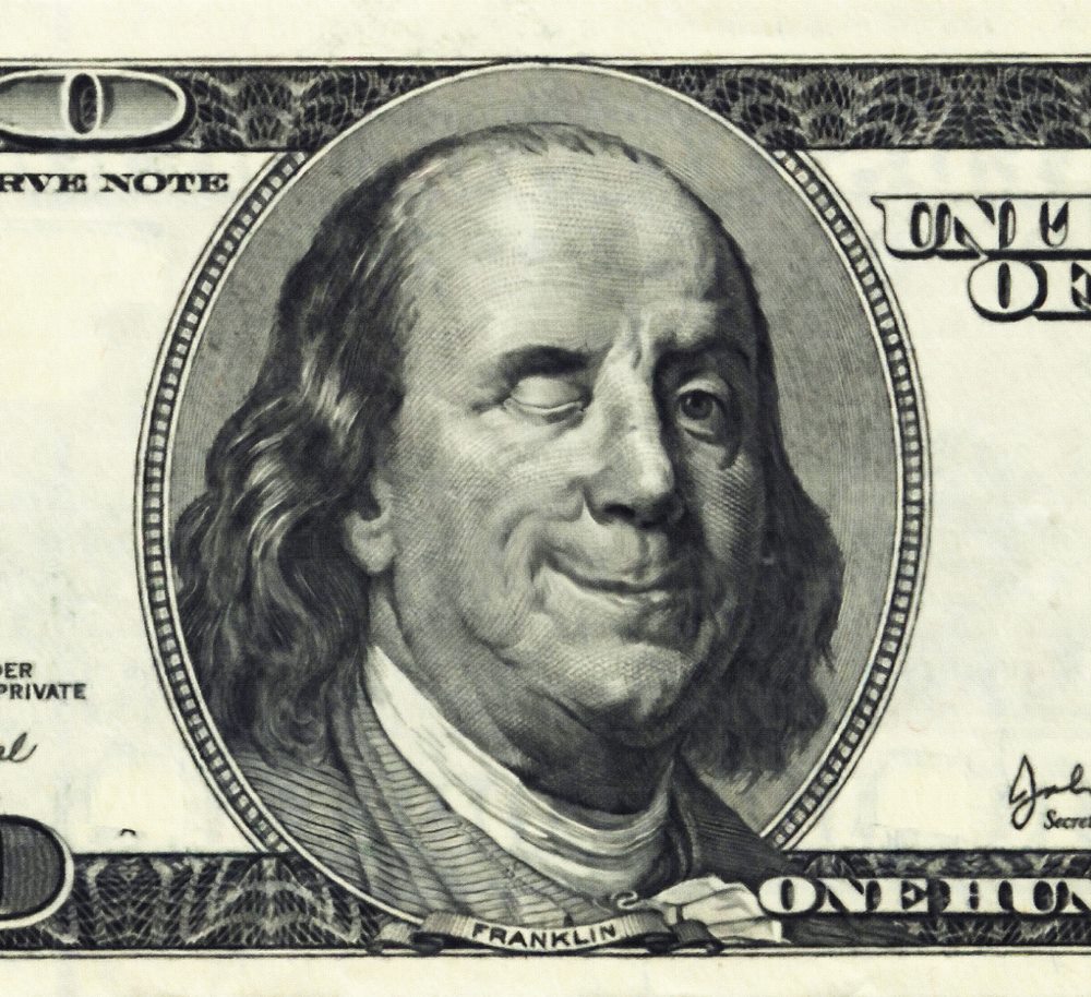 Photograph of 100 dollar bill winking