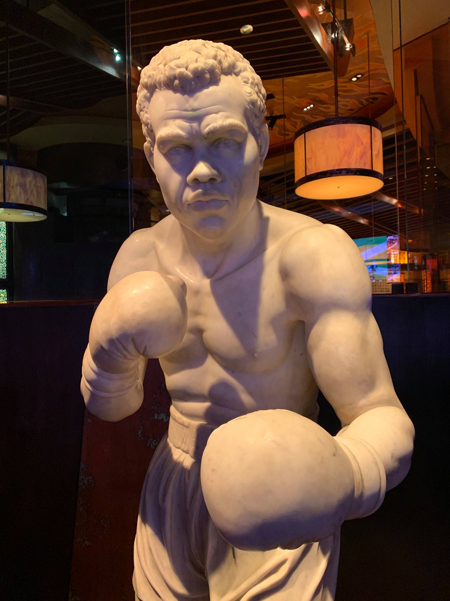 Photograph of boxer statue in hotel lobby