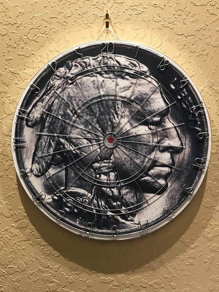 Photograph of dart board with indian